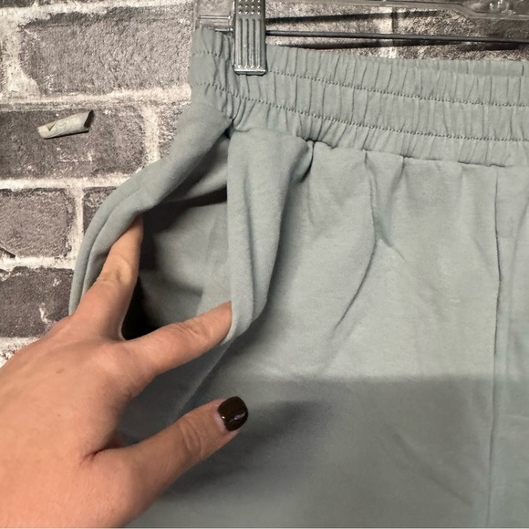 Meshki lounge sweat shorts light blue green pockets cut off - Picture 3 of 9